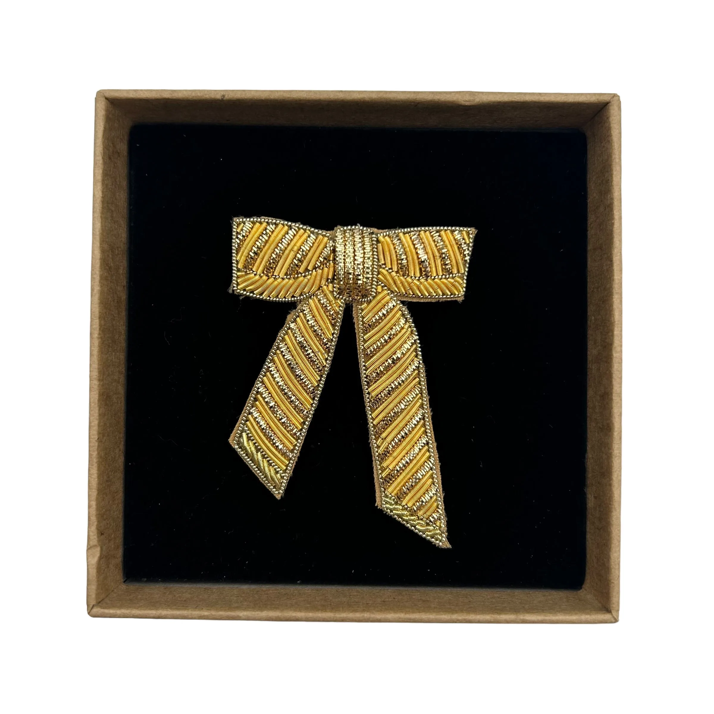 Gold bow brooch / pin